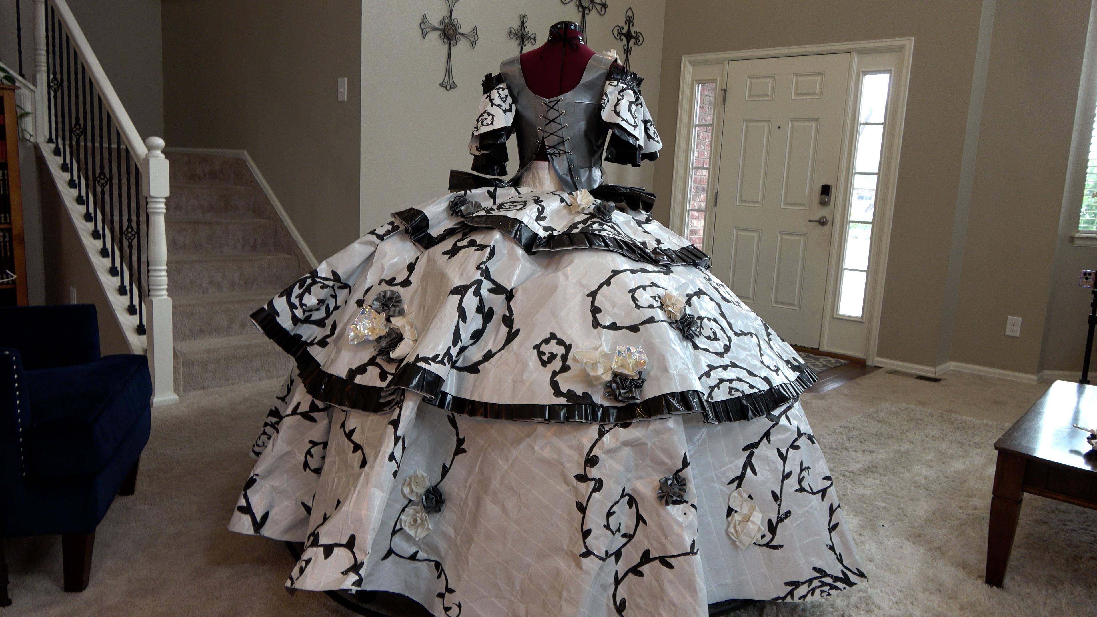 A black and white full dress made out of duct tape